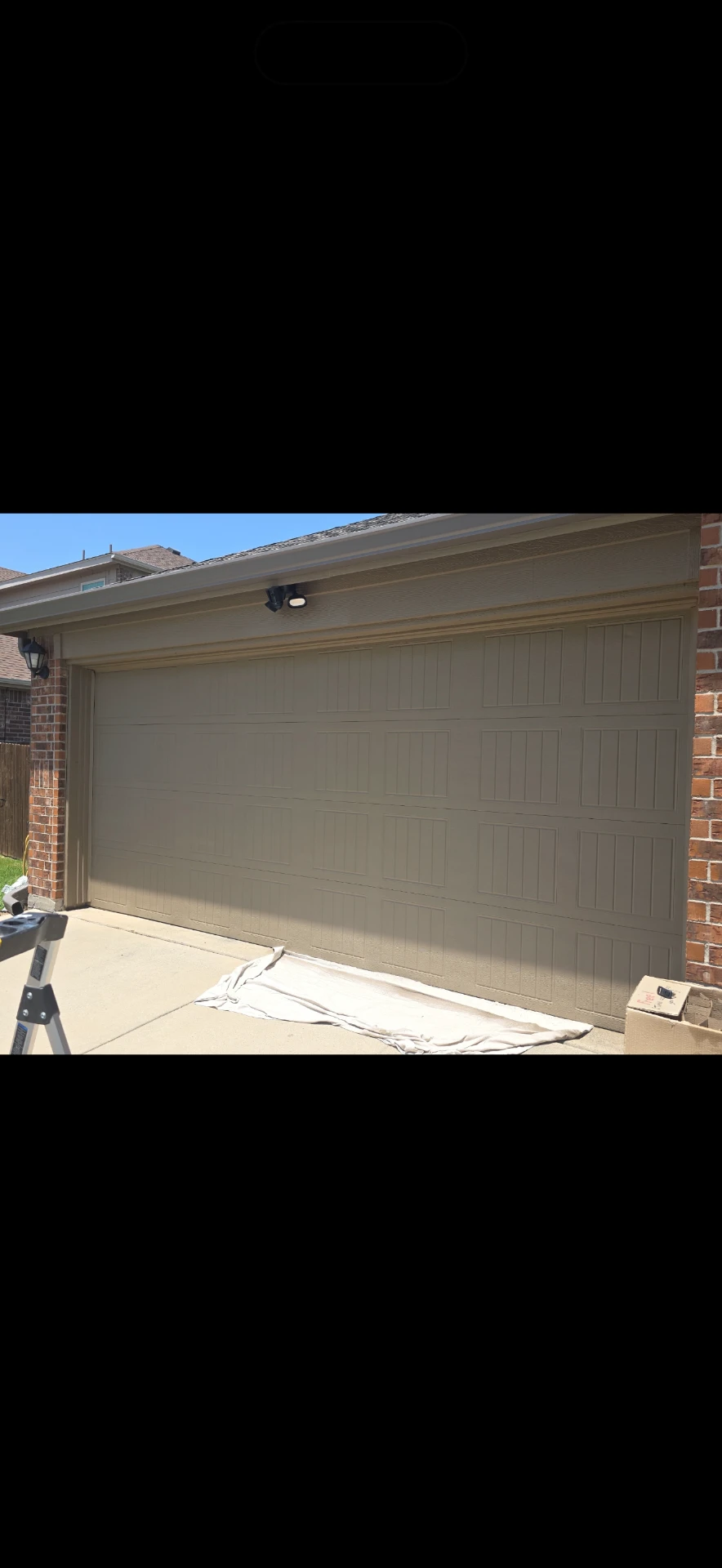 Freshly painted garage door and trim